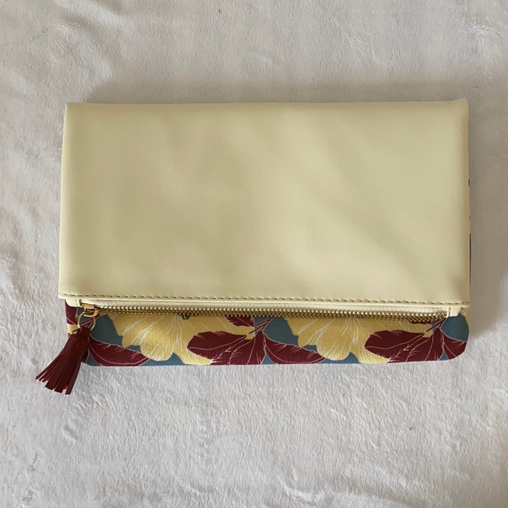 Reversible leather/floral clutch